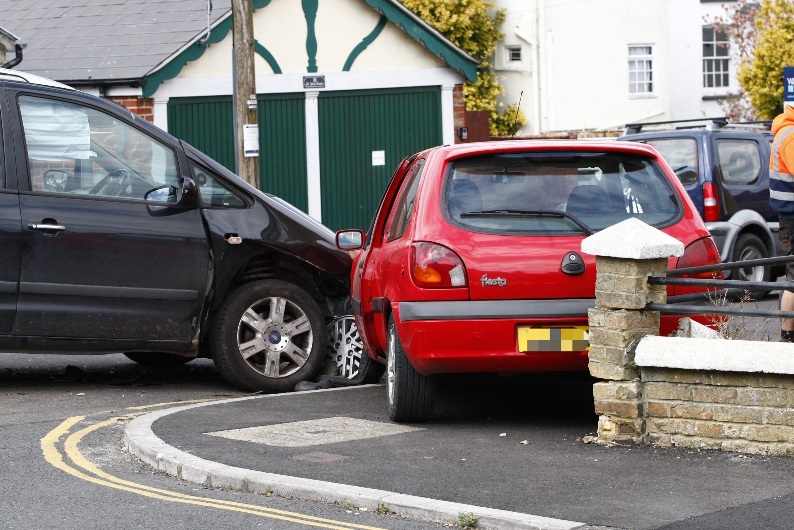 WALL SMASHED IN 2 CAR COLLISION IN NEWPORT