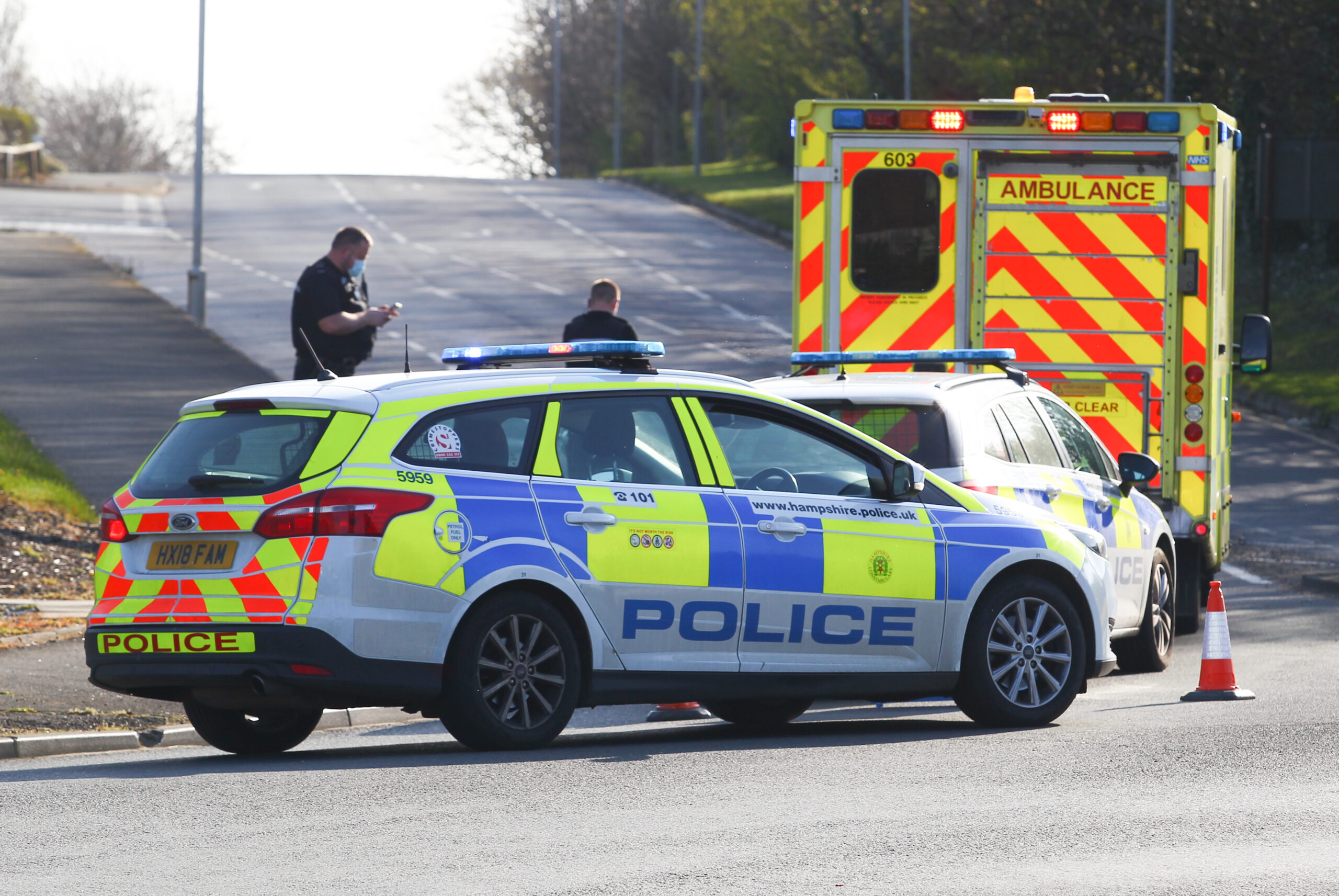 MOTORCYCLIST BEING CHECKED OVER AFTER INCIDENT NEAR TESCO