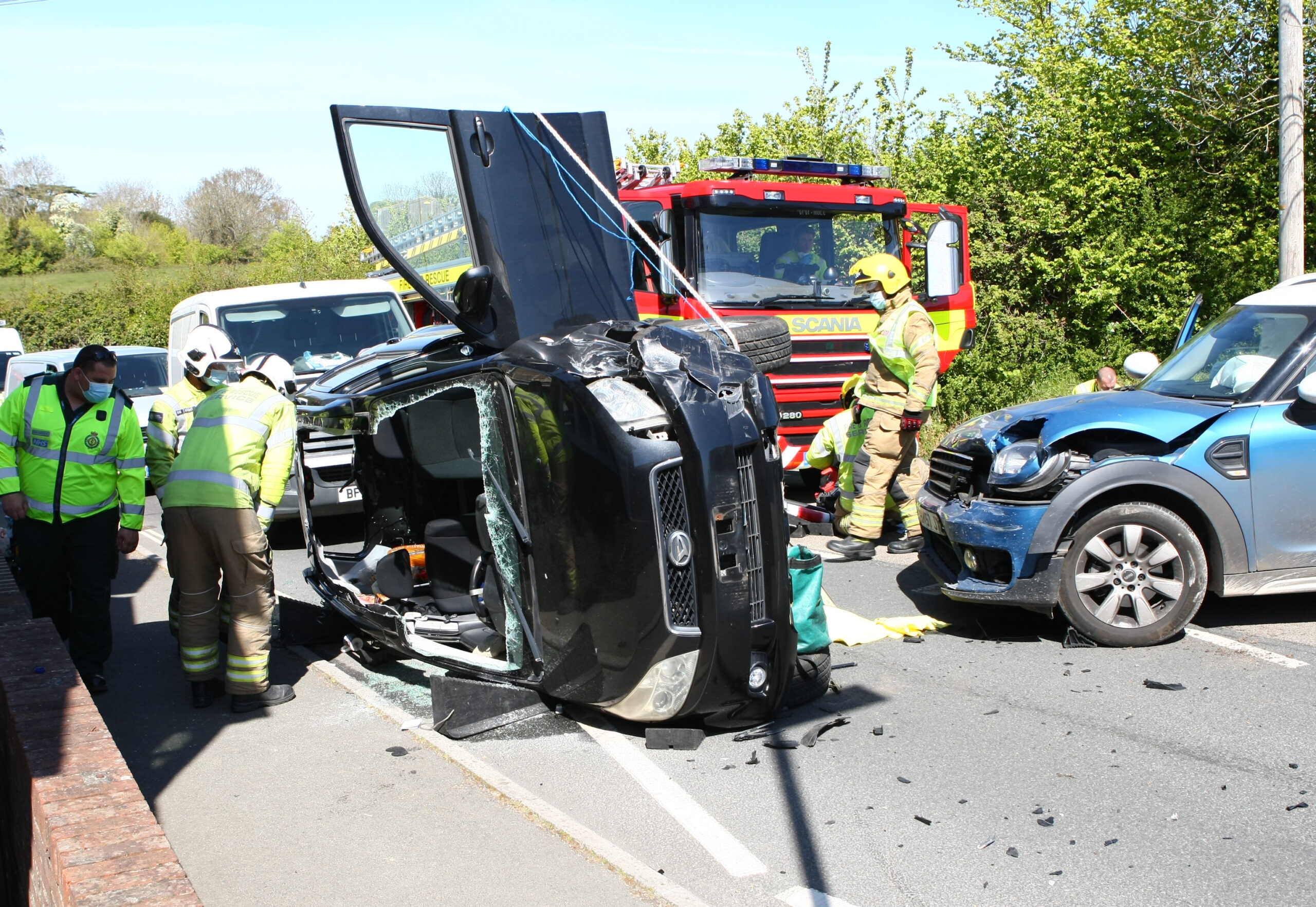 DRIVER TRAPPED AS CAR ROLLS ONTO SIDE IN NETTLESTONE CRASH