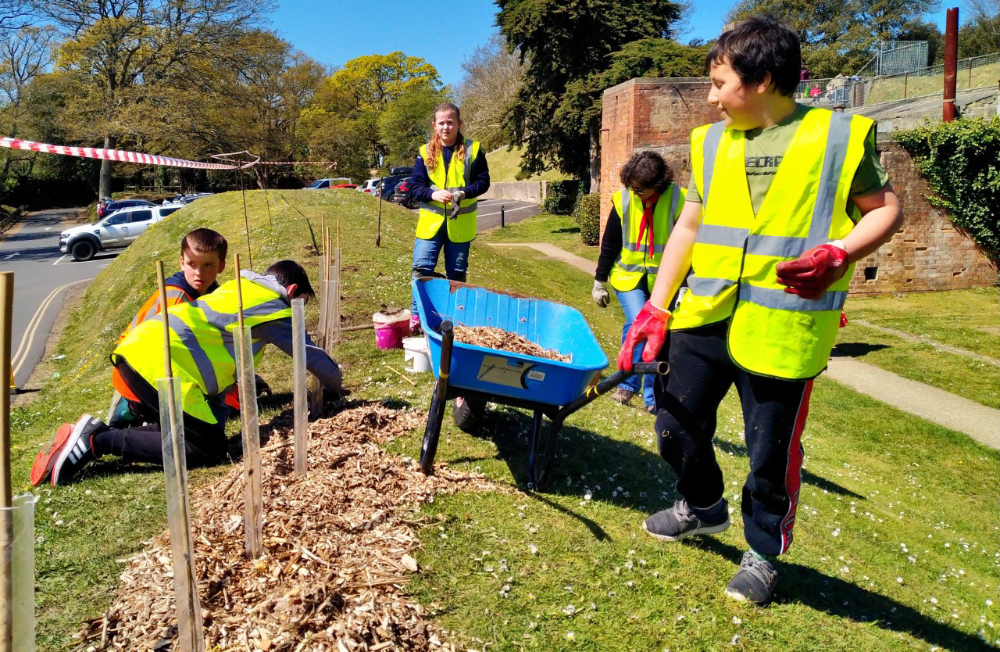 YOUNG VOLUNTEERS PLANT TREES IN COUNCIL PARKS ACROSS THE ISLAND