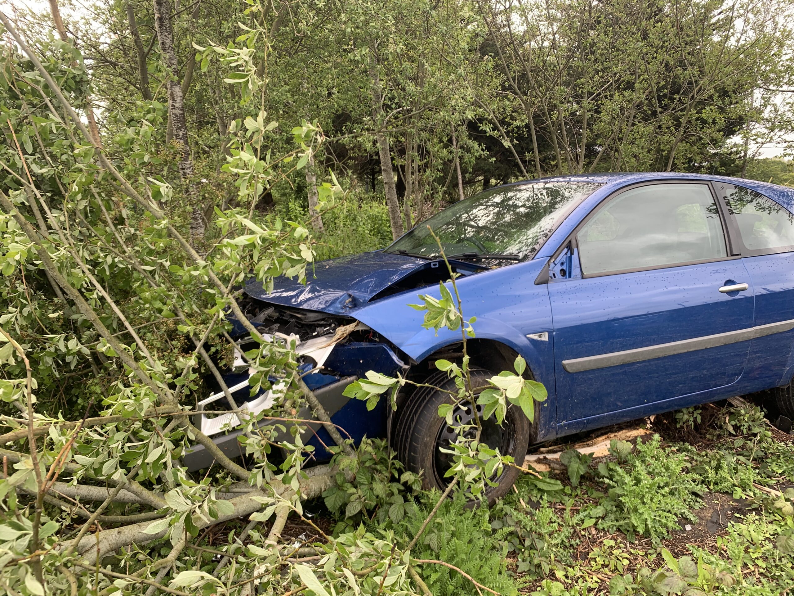 MAN IN 20S ARRESTED AFTER CAR PLOUGHS INTO ROUNDABOUT
