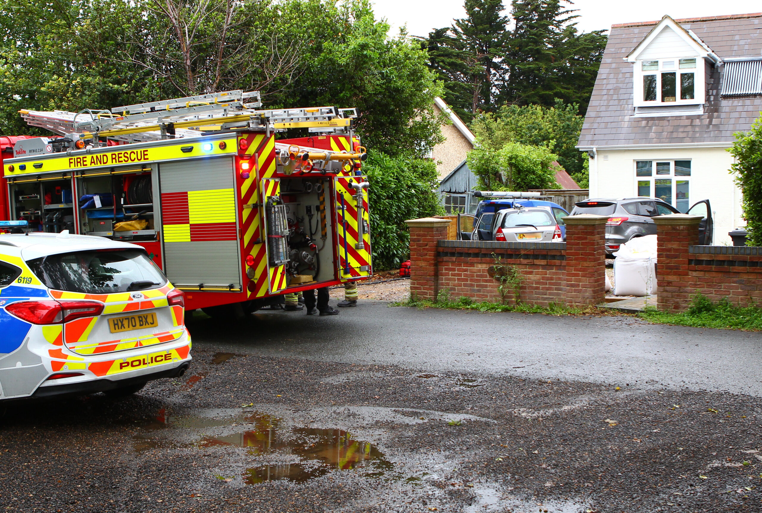 FIREFIGHTERS AND PARAMEDICS RESPOND TO INCIDENT INVOLVING VEHICLE ON DRIVEWAY IN RYDE