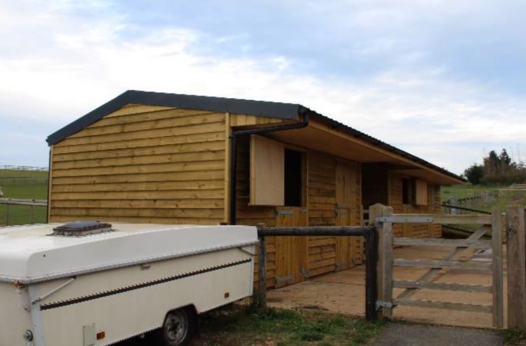 ISLE OF WIGHT COUNCILLOR CHALLENGED AFTER BUILDING LARGER THAN APPROVED STABLE BLOCK