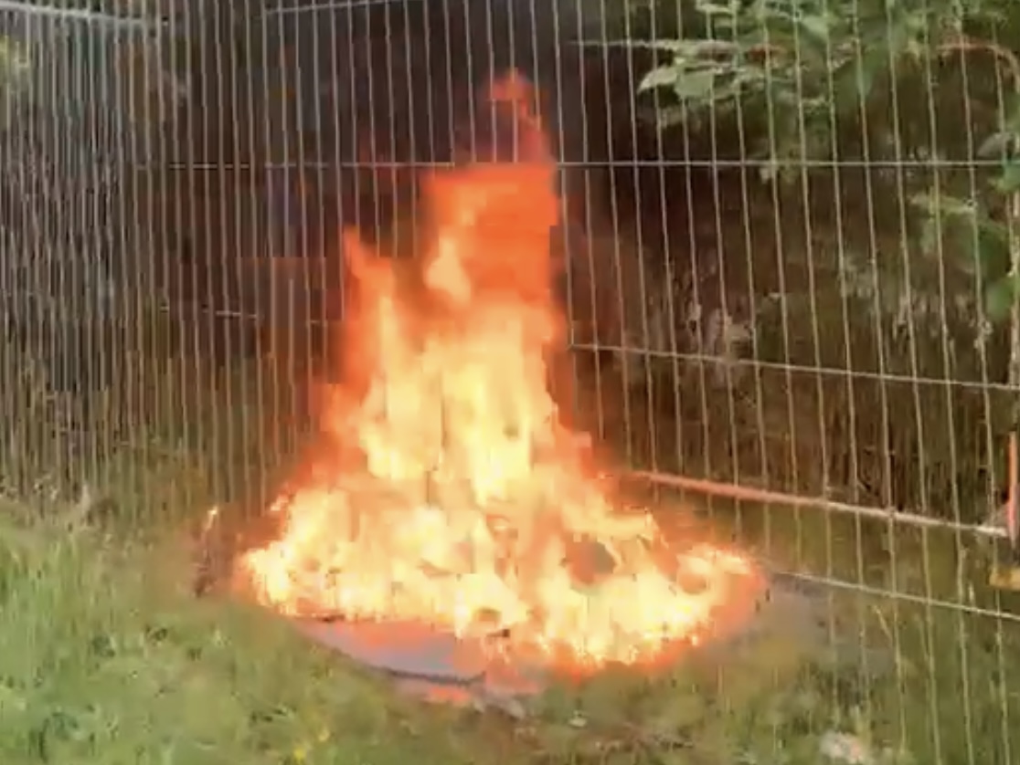 FIREFIGHTERS EXTINGUISH GRASS FIRE IN SANDOWN