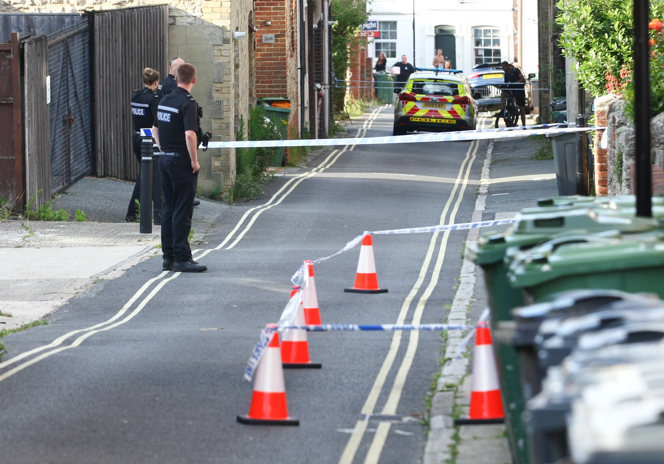 POLICE CORDON OFF BLOOD SPLATTERED STREET IN RYDE