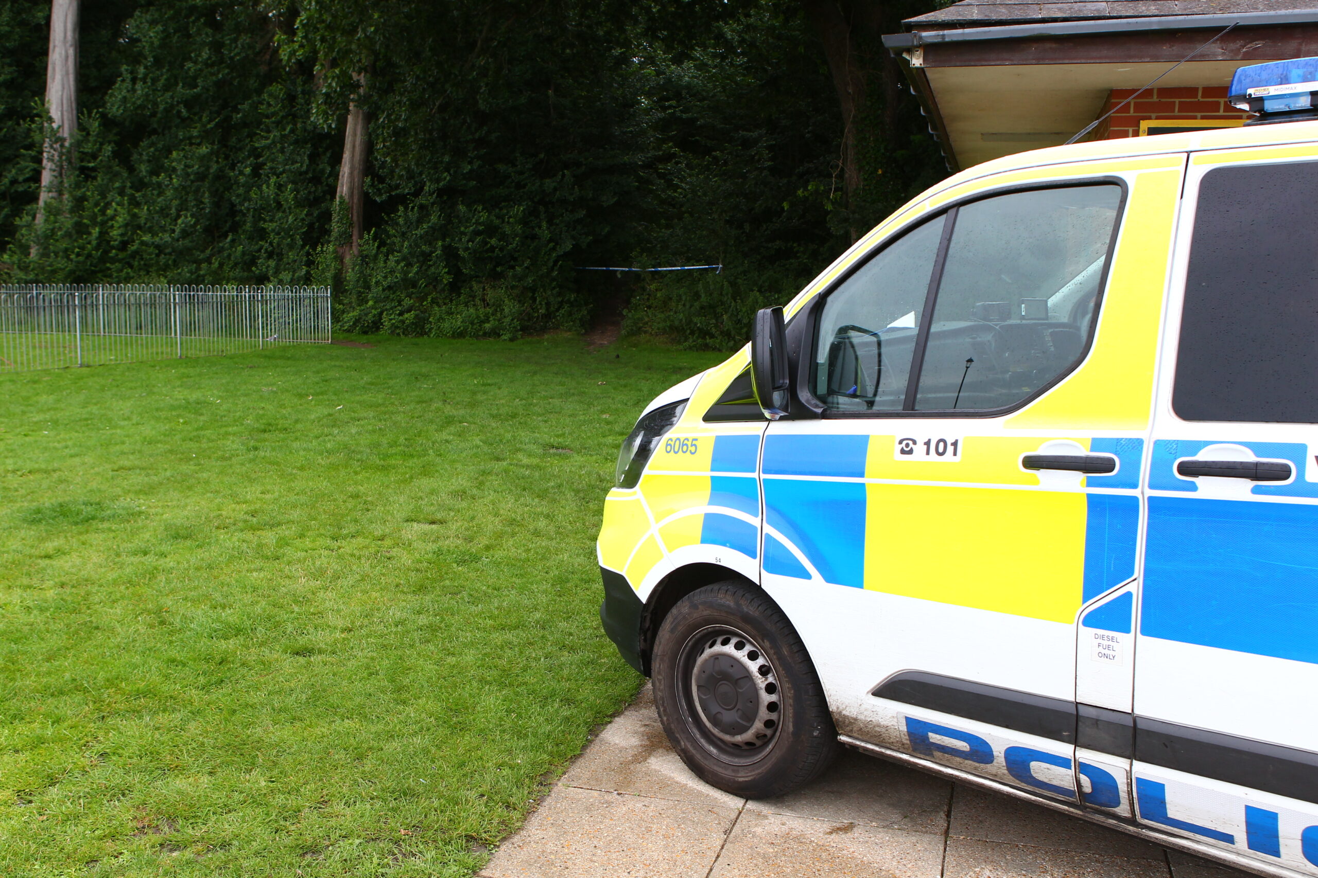 POLICE CORDON OFF WOODLAND AS PART OF GBH INVESTIGATION
