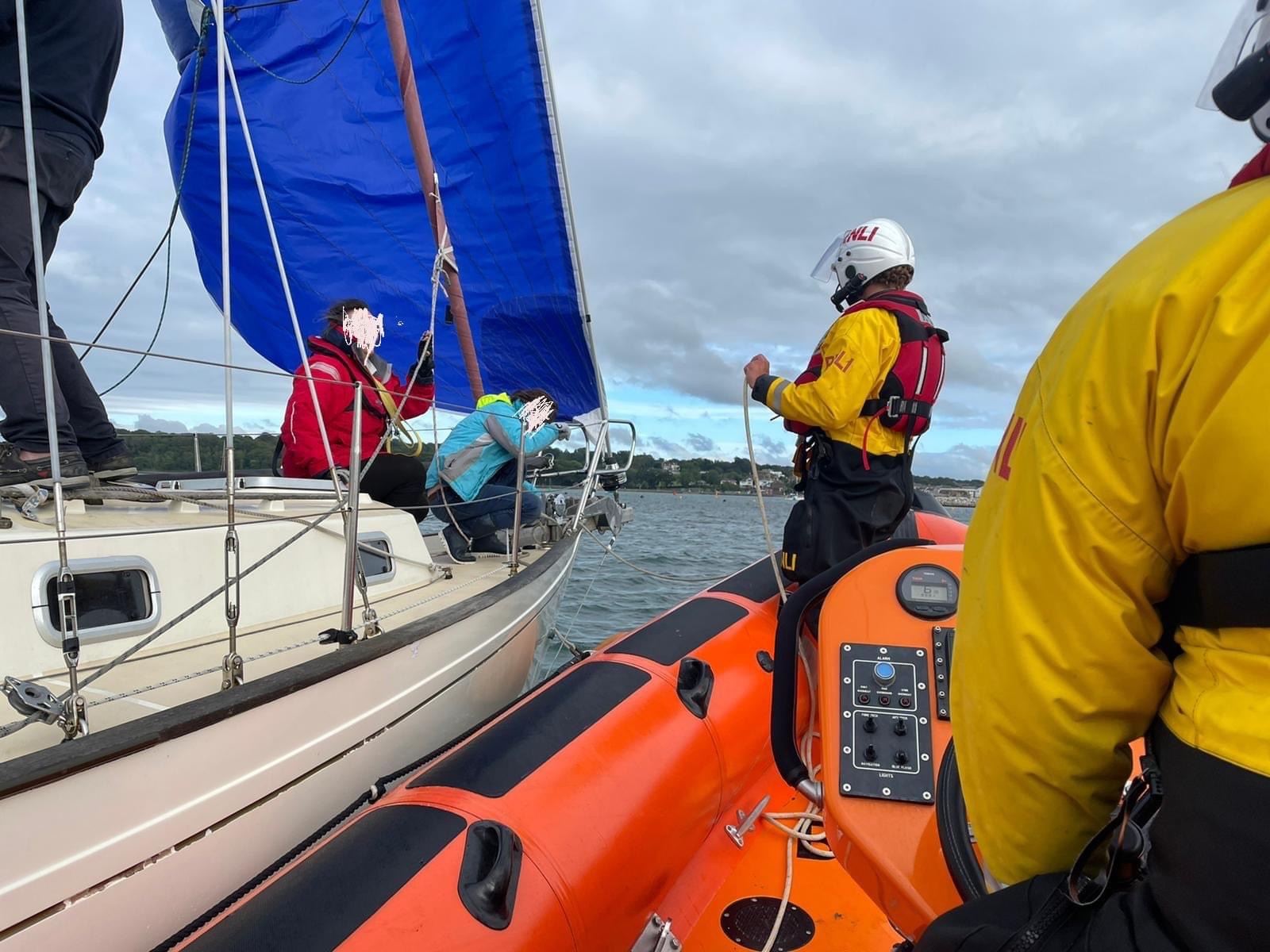HOLED YACHT AND JAMMED HEADSAIL GIVE COWES LIFEBOAT A BUSY DAY