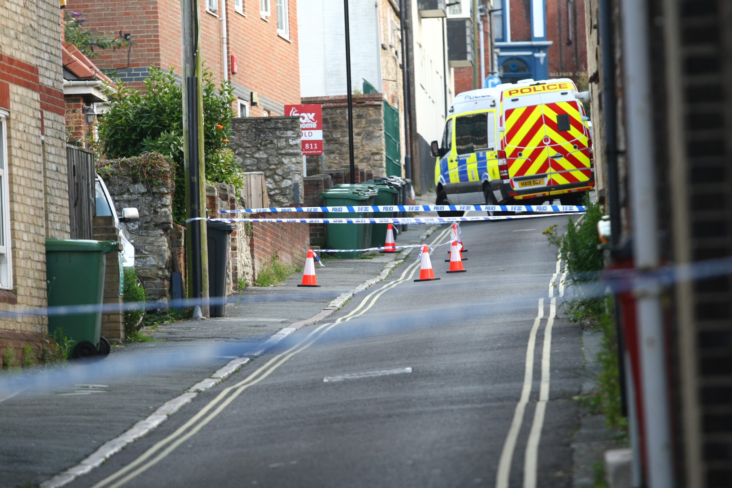 POLICE CORDON OFF BLOOD SPLATTERED STREET IN RYDE