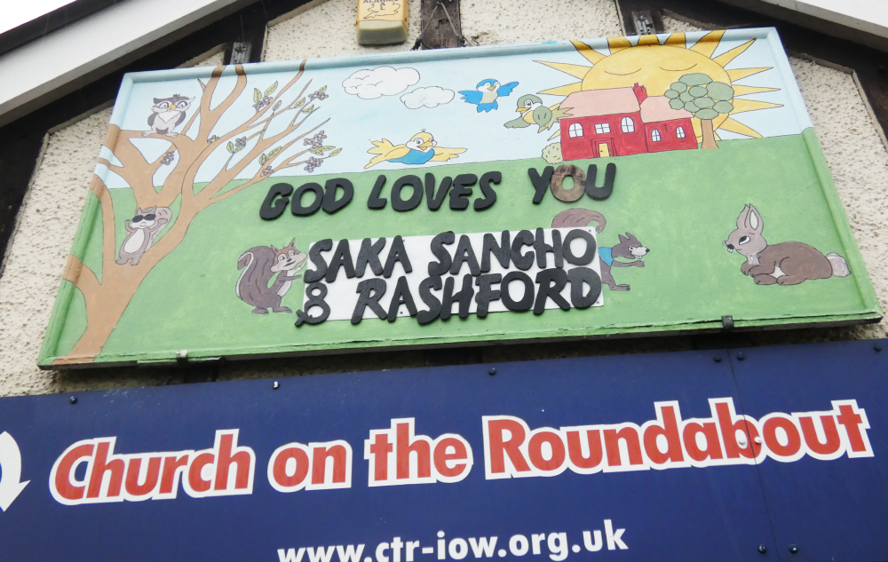 CHURCH ON THE ROUNDABOUT SAYS ‘GOD LOVES YOU SAKA, SANCHO & RASHFORD’