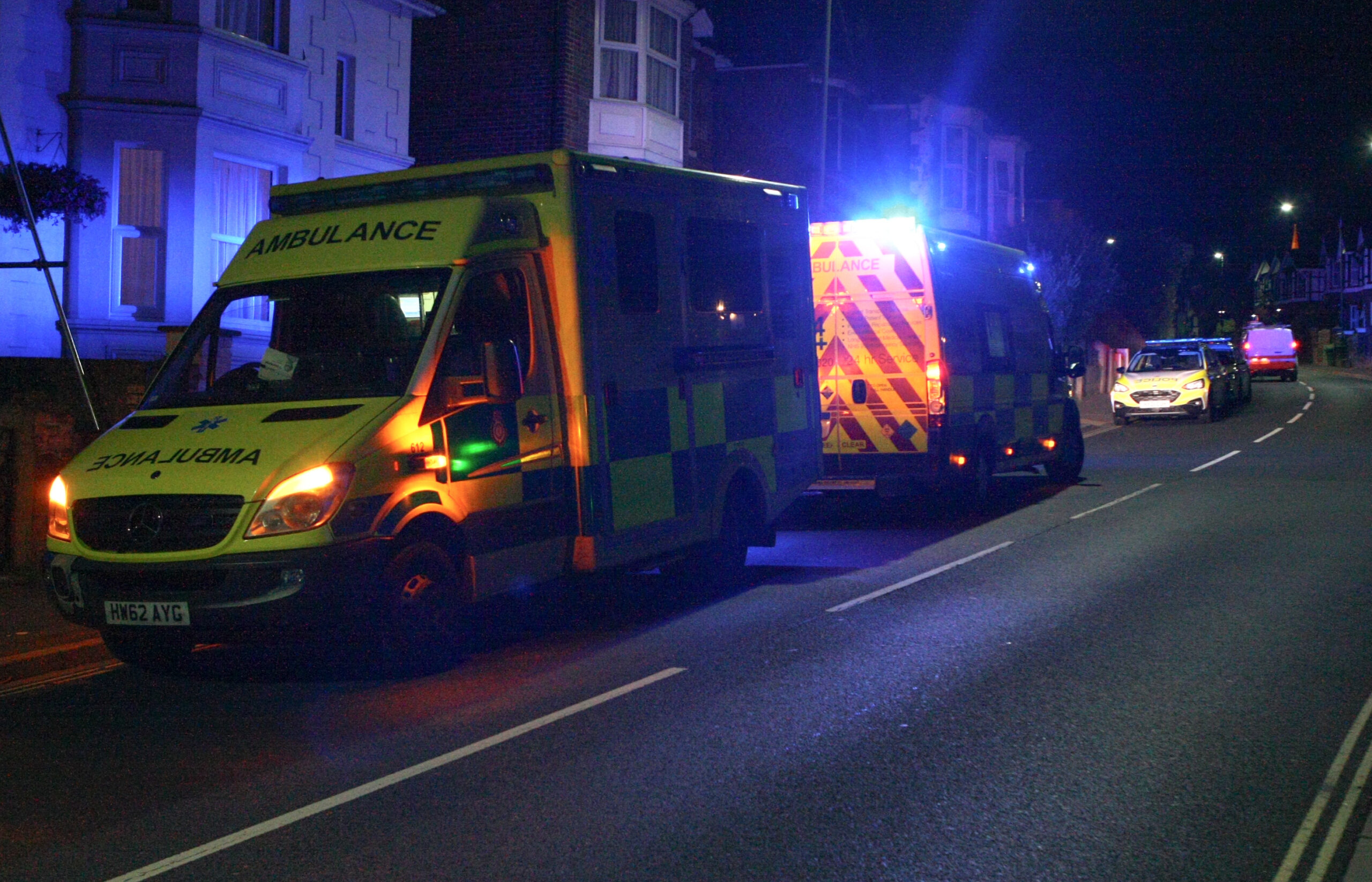 PARAMEDICS TEND TO INJURED MOTORCYCLIST IN RYDE