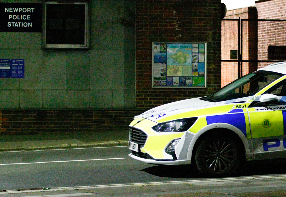 MEN ARMED WITH KNIFE AND BASEBALL BAT ARRESTED AFTER ALTERCATION OUTSIDE POLICE STATION