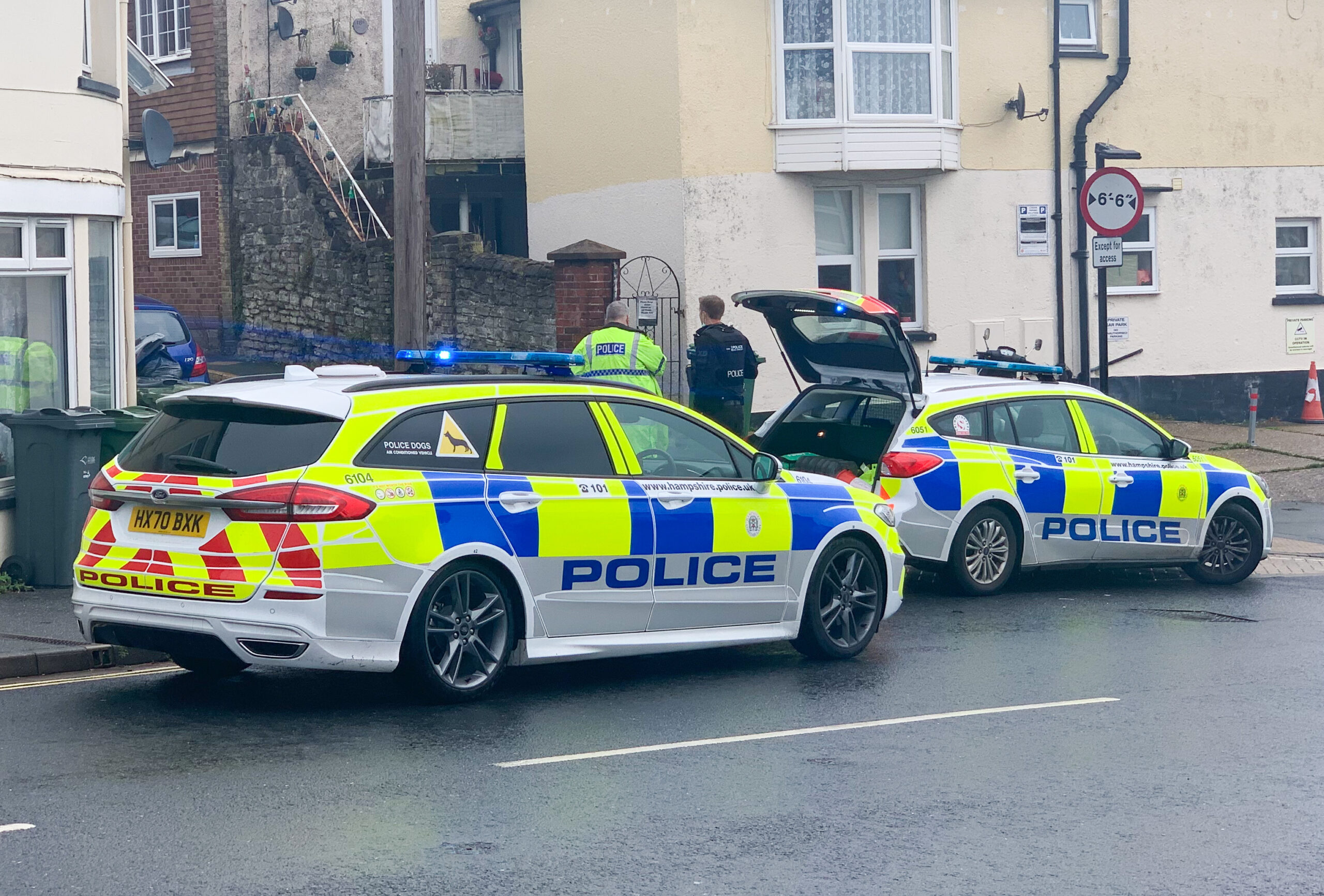 POLICE AND PARAMEDICS TEND TO FALLEN SCOOTERIST IN RYDE