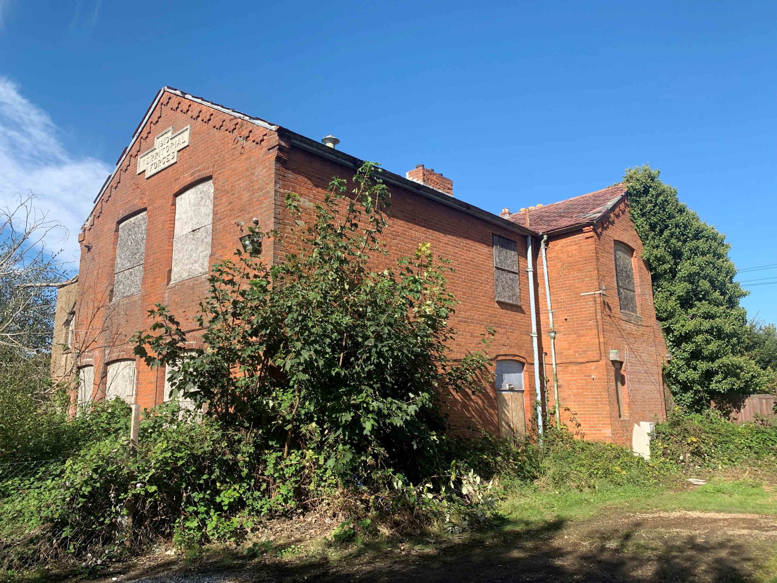 ARMY DRILL HALL AND SEASIDE CAR PARKING AMONGST LOTS GOING TO AUCTION