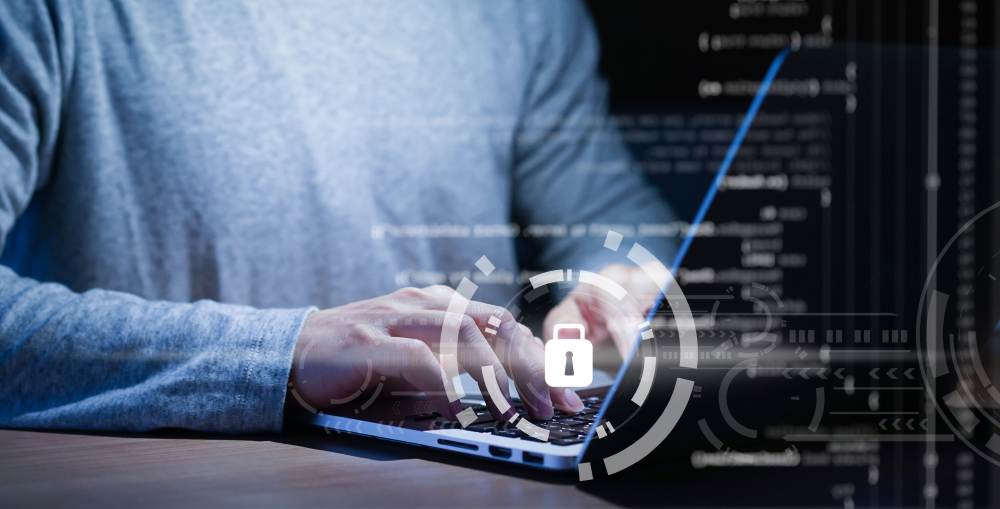 Programmer-typing-working-laptop-programming-about-cyber-security