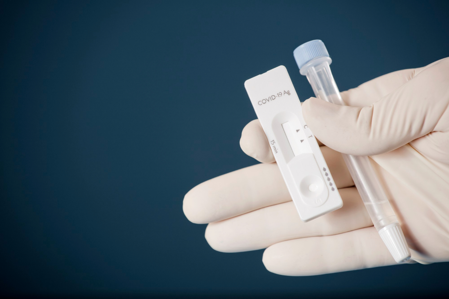 Physician-who-owns-covid-19-antigen-test-kit-with-covid-19-2019-ncov-viral-disease-test-kit-sars-cov-2-coronavirus-virus-lab-card-kit-test-rapid-covid-19-test