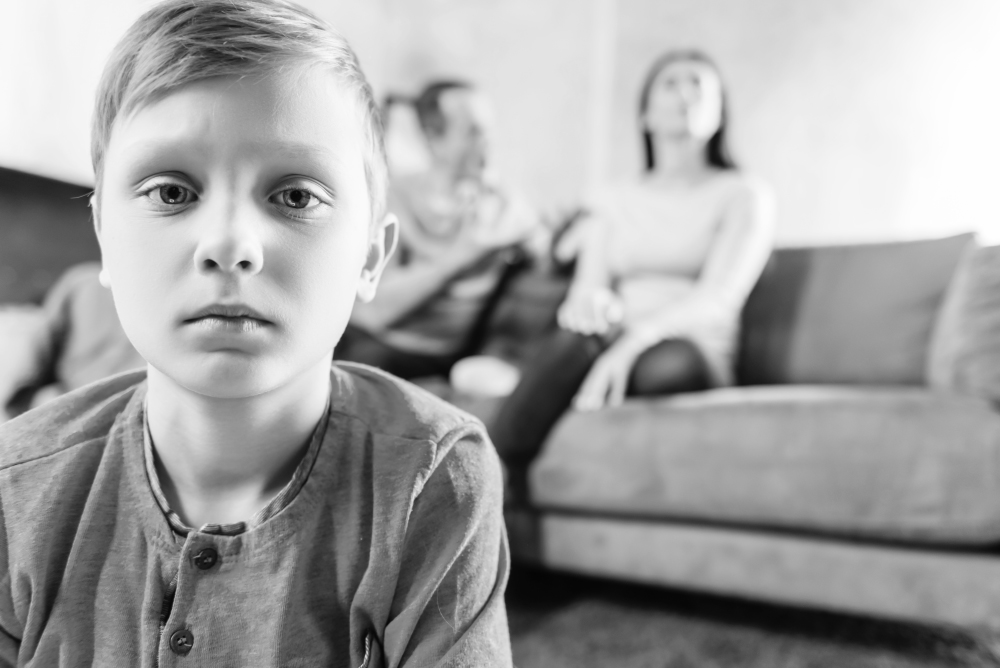 Little Boy Feeling Lonely While His Parents Quarrelling