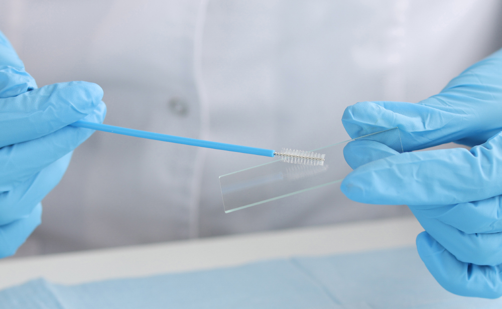 Doctor In Gloves Holds Brush For Smears And Glass In Laboratory
