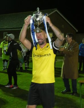 Captain Lifts Trophy (best)