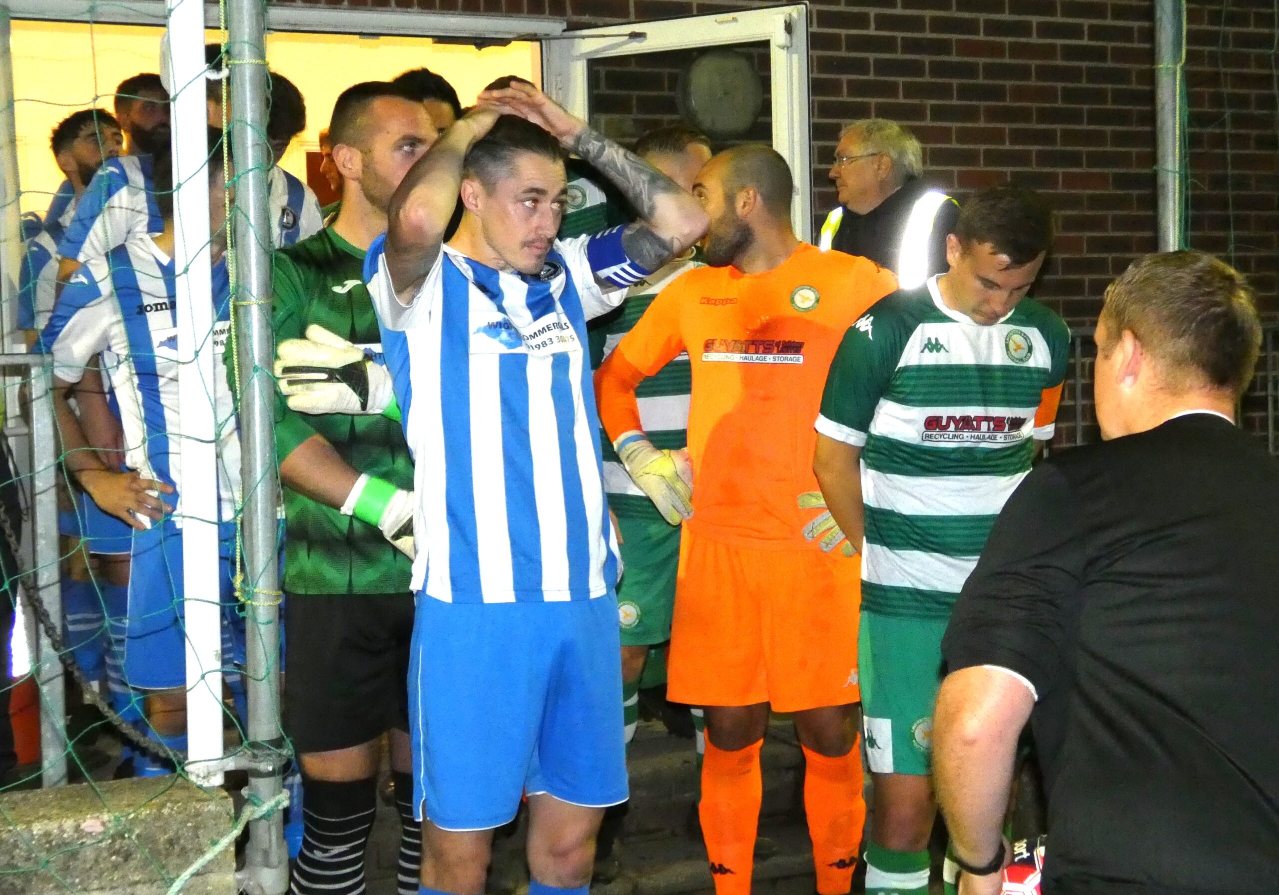 John Mckie Leads Out Team