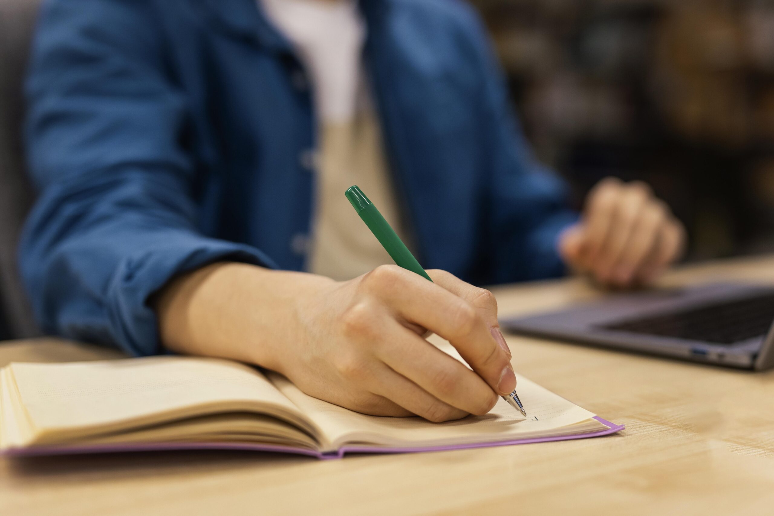Boy-studying-university-library