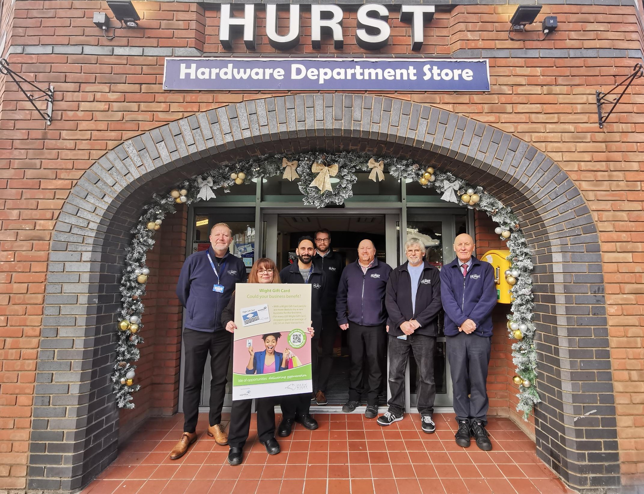 Jevon Kennedy, Managing Director Of Hurst (far Left) With The Hurst Team And The Iow Gift Card