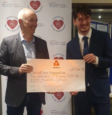 Presentation To Geoff Underwood Of The Wightaid Foundation By Club Captain Ben Sanderson