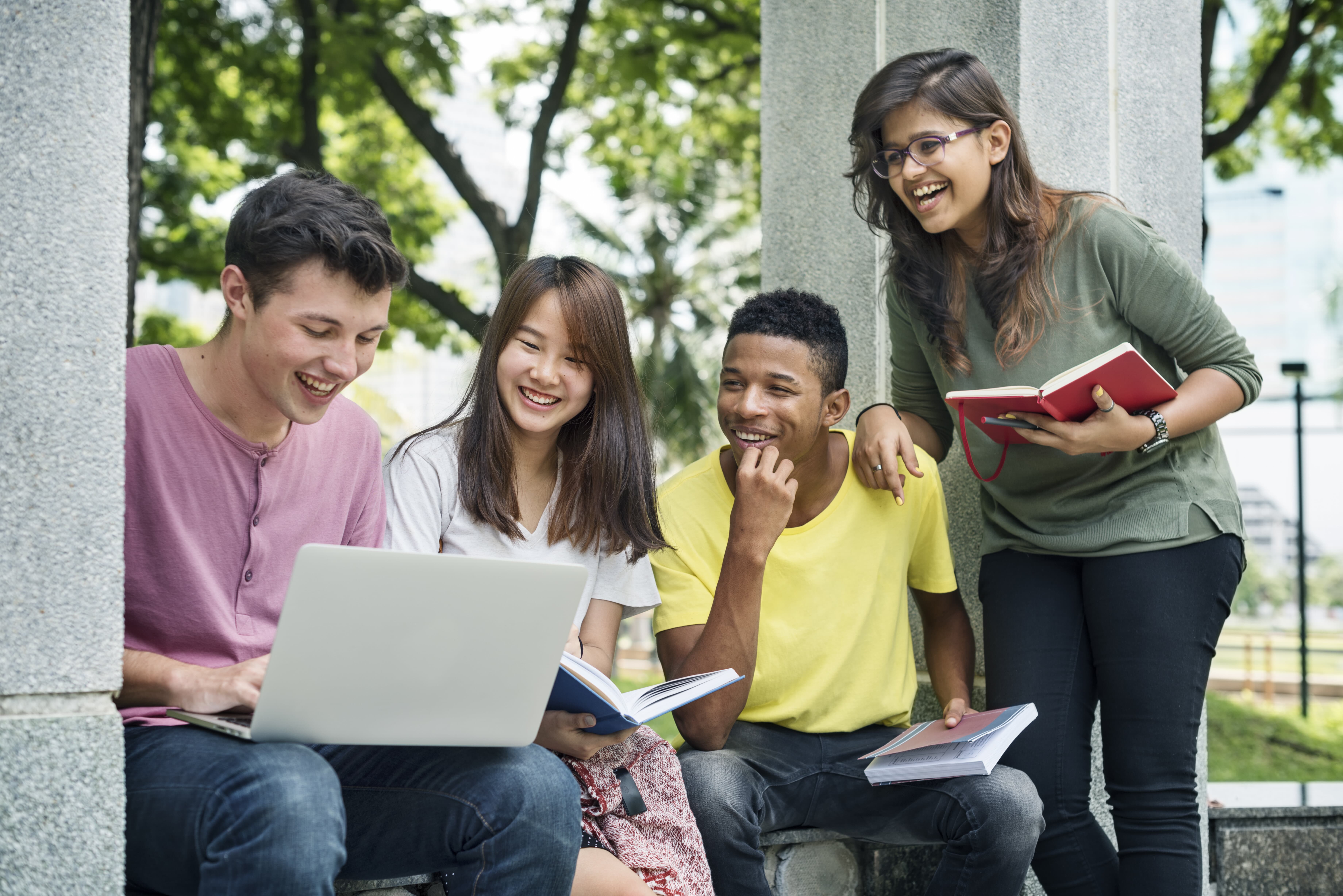 Young-diverse-group-studying-outdoors-concept-2022-12-16-01-09-44-utc