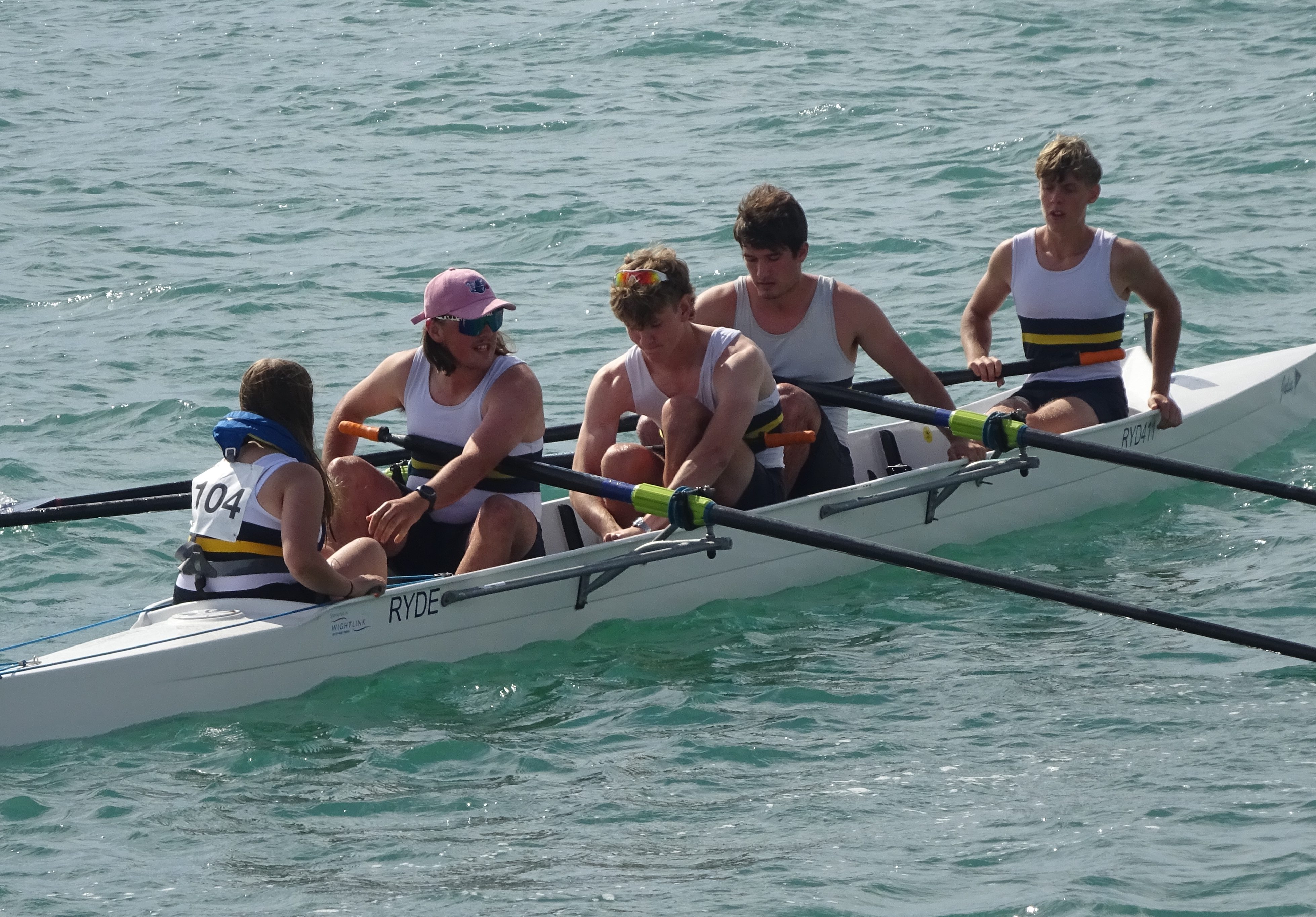 Ryde's Championship Coastal Junior Crew Going Afloat For Their Race. Mia Mackay (cox), Paddy Kearney, Will Hunt[37534]