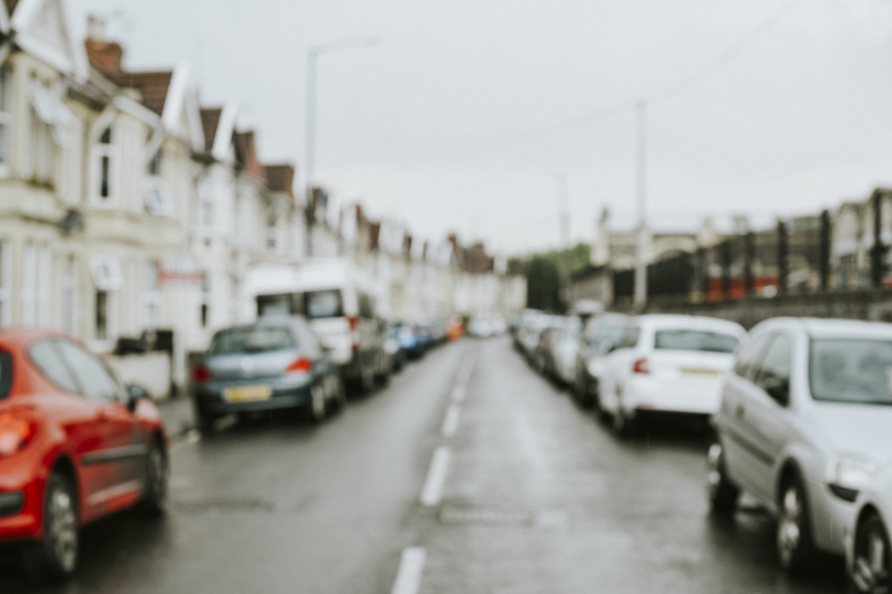 Cars Parked Along The Row Of Houses
