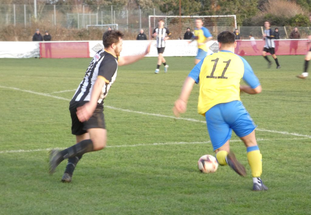 Nicky Vyse Takes On Alresford Defender