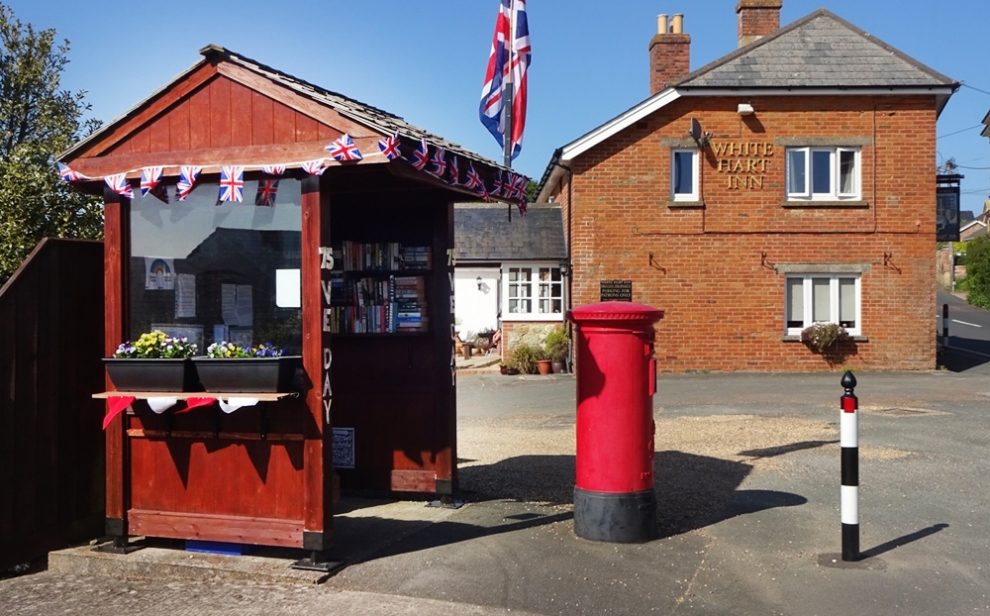Bus-shelter-and-white-hart-small-990x616