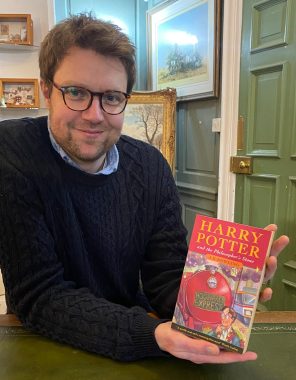 Hansons Books Expert Jim Spencer With The Harry Potter First Edition - Credit Hansons