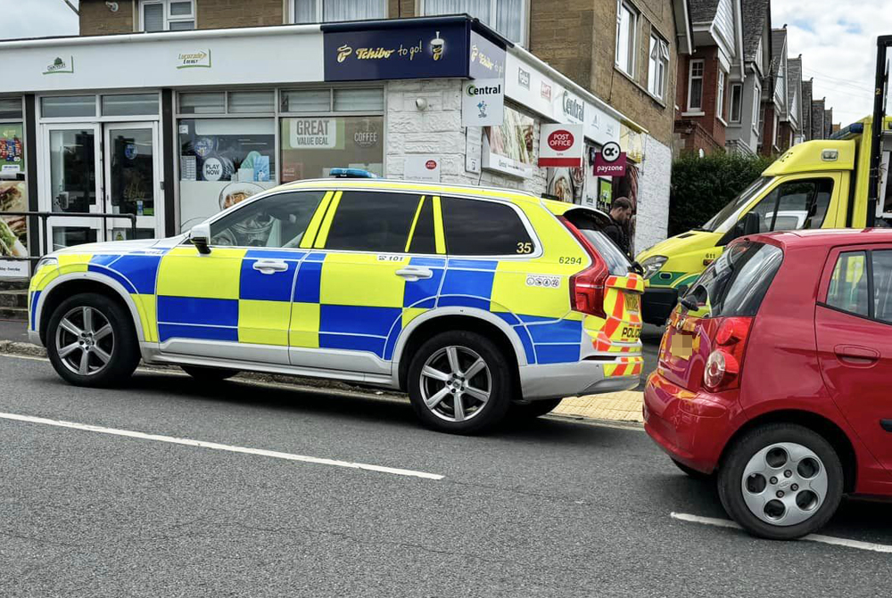BIKER OVER BONNET IN CRASH BETWEEN MOTORCYCLE AND CAR IN LAKE