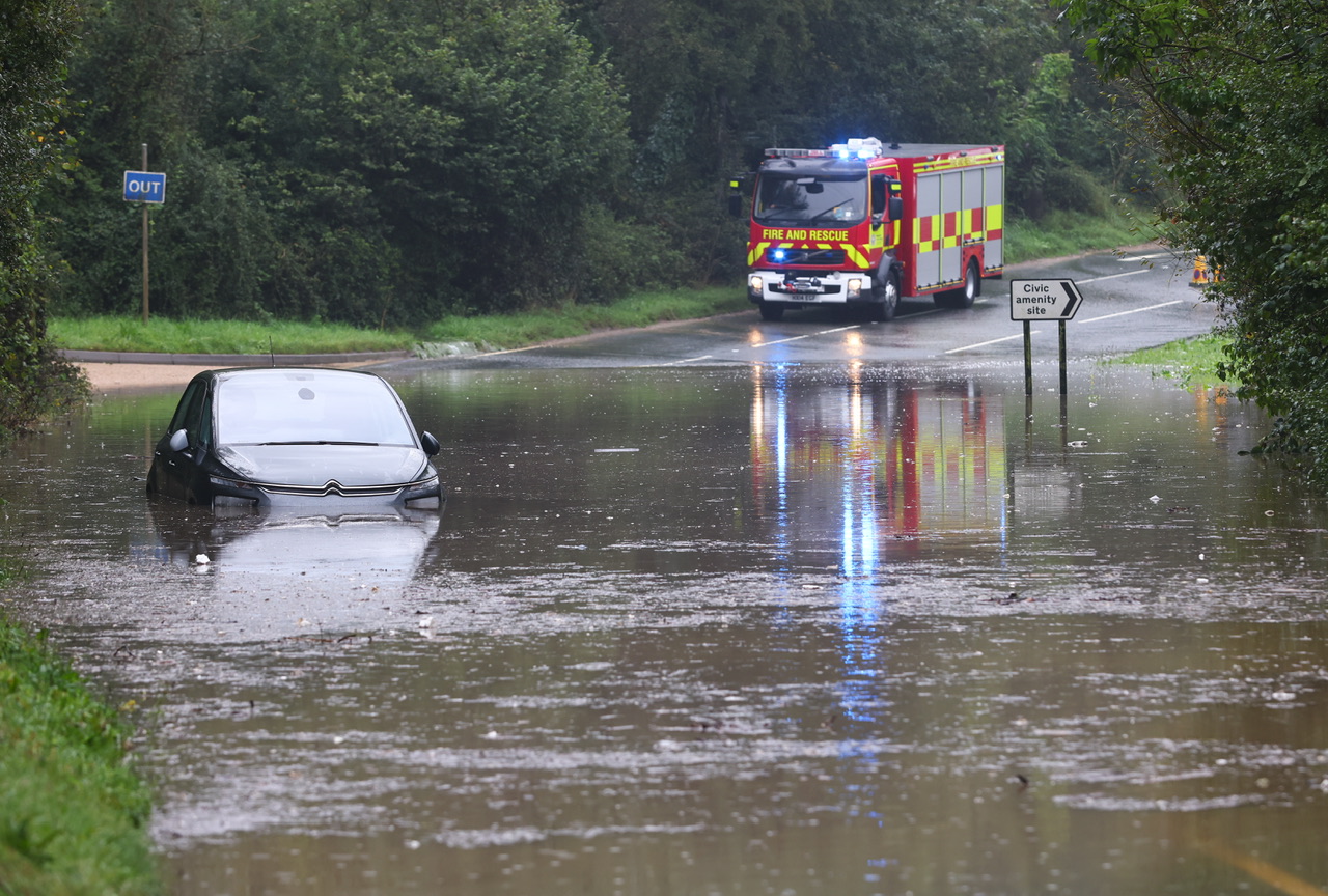 VEHICLE STRANDED AND ROADS UNDERWATER AS FLASH FLOODING HITS