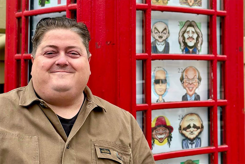 ARTIST ADAM BROWN FILLS PHONE BOX FULL OF CARICATURES WITH LOCAL CONNECTIONS