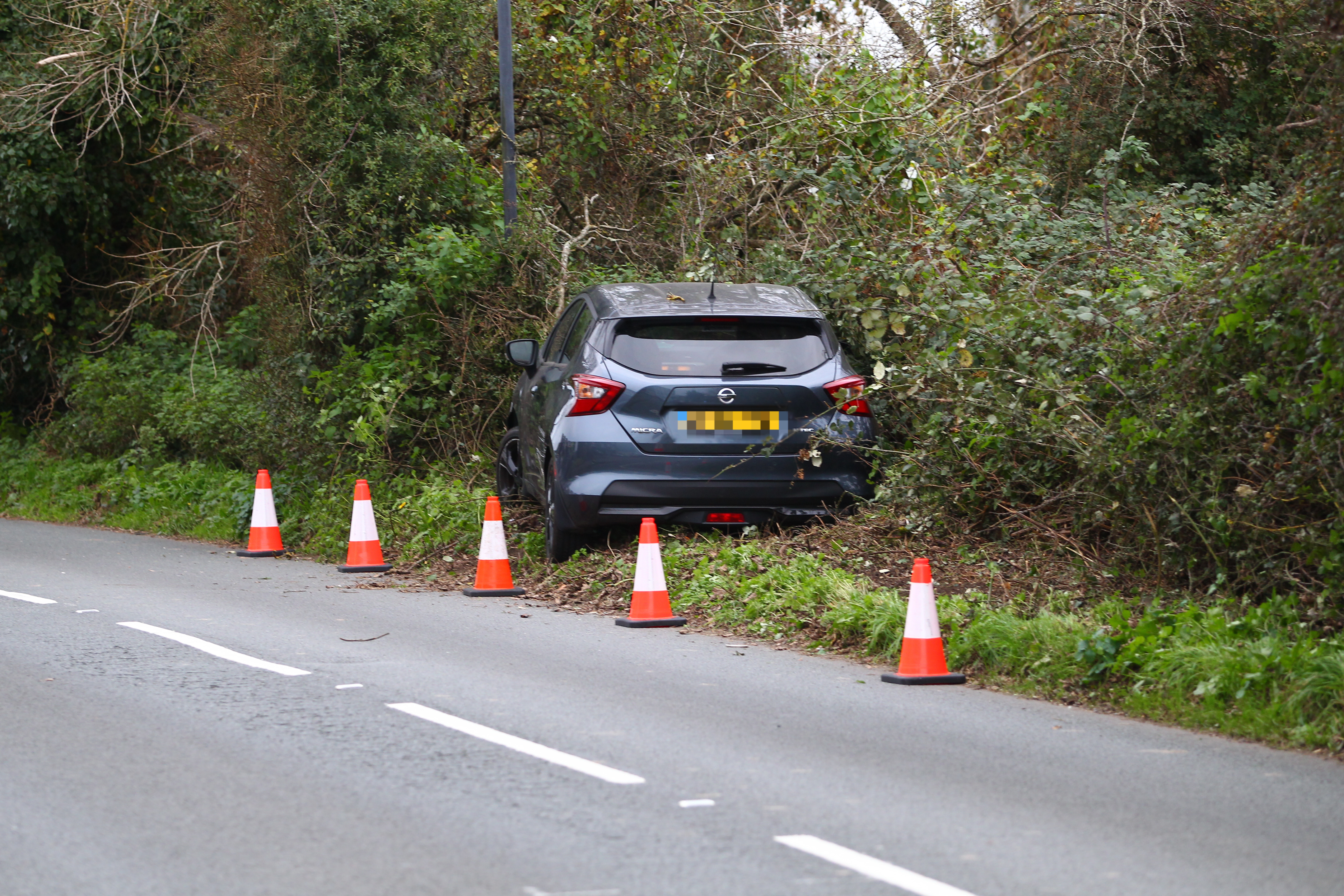 MICRA DRIVER TAKEN TO HOSPITAL AFTER CRASH INTO HEDGE IN ST HELENS