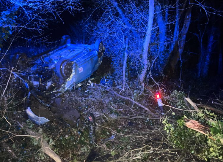 DRIVER ARRESTED AS CAR FLIPS OVER STREAM NEAR SHALFLEET
