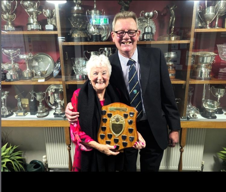 DOT PRESENTED WITH MILLENIUM TROPHY FOR RAISING £2,300 WITH TANDEM PARACHUTE JUMP