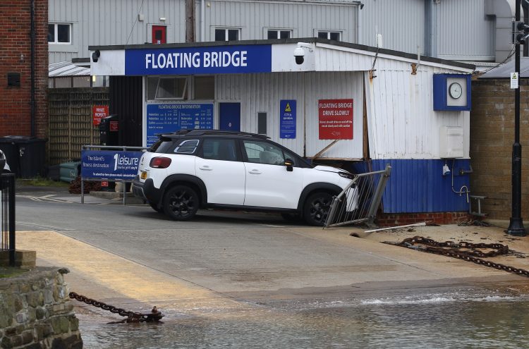 UPDATED: DRIVER RUSHED TO HOSPITAL AS CAR CAREERS INTO FLOATING BRIDGE BOOTH