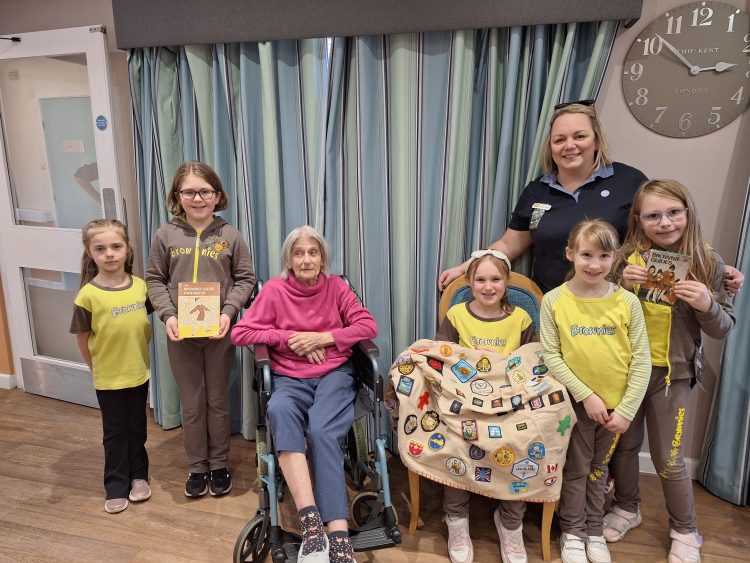 CARE HOME RESIDENT MADGE RELIVES HER BROWNIE LEADER DAYS