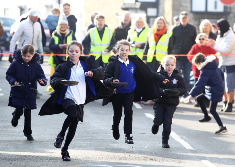 PHOTOS: ISLE OF WIGHT SCHOOLCHILDREN FLIP THEIR WAY TO VICTORY ON PANCAKE DAY