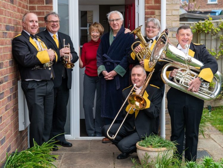 COWES MAN AWOKEN BY BRASS BAND SURPRISE ON 80TH BIRTHDAY