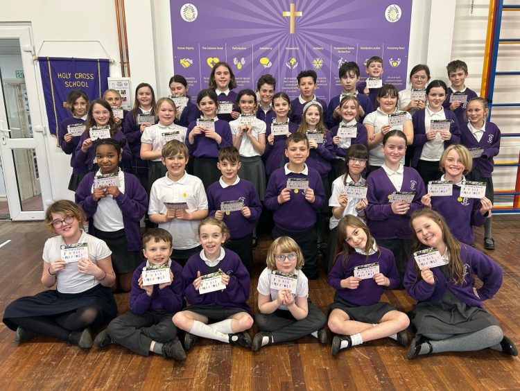 PUPILS AND HEAD AT HOLY CROSS PRIMARY COMMENDED FOLLOWING SCHOOL INSPECTION