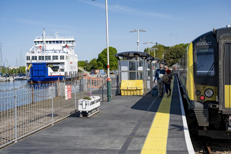 TRAIN AND FERRY PASSENGERS DISCOVER THE WORLD OUTSIDE THEIR WINDOWS