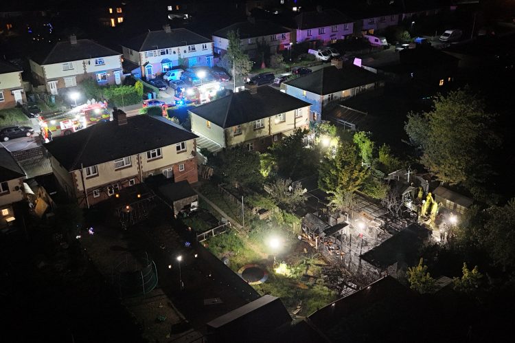 GARDEN BLAZE SENDS BLACK SMOKE BILLOWING INTO NIGHT SKY IN COWES