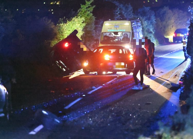 CAR RIPS OFF WHEEL AND LANDS ON ROOF IN LATE NIGHT DOWNS CRASH