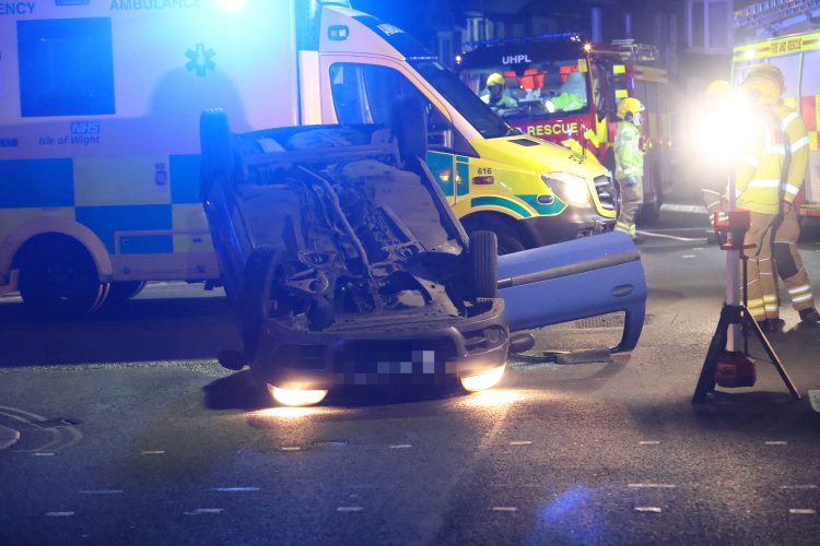 CLIO ROLLS ONTO ROOF IN UNUSUAL CRASH ON BUSY RYDE JUNCTION