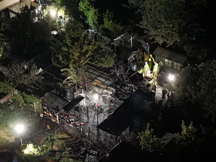 GARDEN BLAZE SENDS BLACK SMOKE BILLOWING INTO NIGHT SKY IN COWES