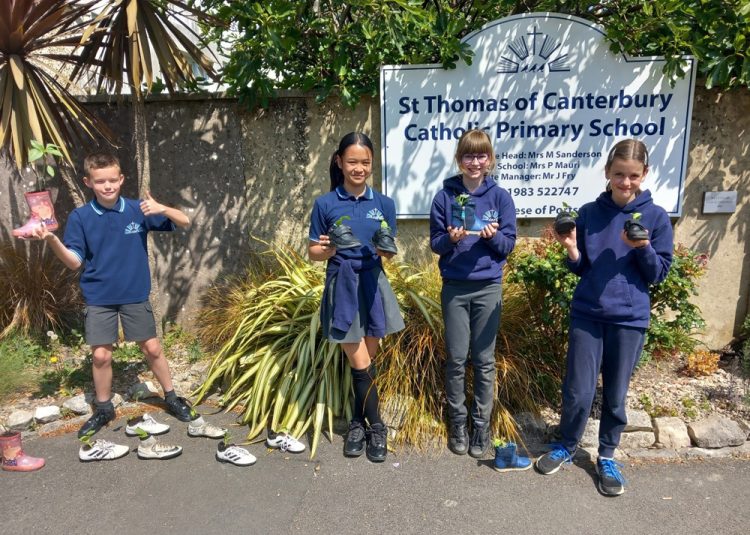 GREEN FINGERED ST THOMAS’ PUPILS PLANT FRUIT AND VEG IN OLD SHOES!