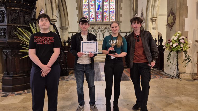 SCHOOLS DEBATING COMPETITION SUCCESS FOR ISLAND VI FORM TEAM